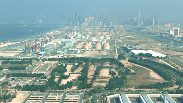 Aerial view of a modern power plant and water desalination complex in Dubai, UAE