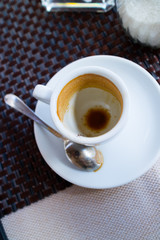 empty coffee cup with spoon