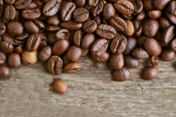 coffee beans on wooden background
