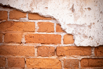 Old brick wall, old house wall that makes bricks, old house details in rural Thailand, Laos