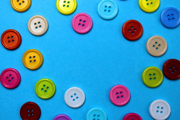 Multi-colored buttons laid out in the form of a frame