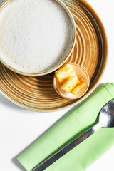 An exquisite culinary dish on a white table. Restaurant serving.