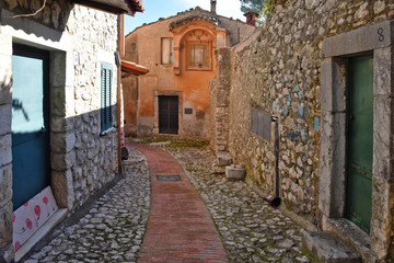 Veroli, Italy, 01/03/2020. A narrow street between the old houses of a medieval village