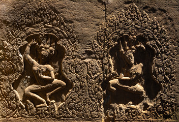 Amazing bas reliefs depicting the beautiful Apsara deva on the wall at Angkor Wat Temple. Location:...