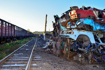 Fototapeta premium The recycling of scrap metal, stacked rows presovanny machines