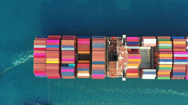 Aerial view of large container cargo ship in sea.