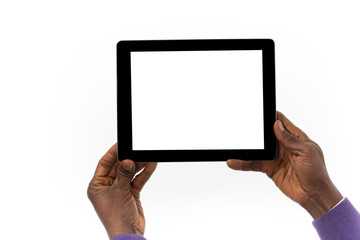 African man holding a tablet computer in his hand