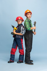 Confident. Kids dreaming about profession of engineer. Childhood, planning, education and dream concept. Want to become successful employee in manufacturing, building industry, infrastructure.