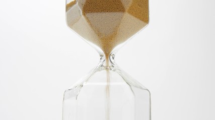 glass sand clock on white with golden balls instead of sand falling. Time planing, deadline, concept