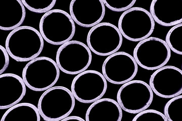 Blurred abstract background of cardboard rings. Abstract blurry graphic texture background.