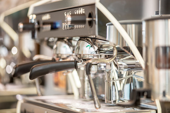 Filter holder for espresso machine and coffee beans for professional coffee equipment.Close up