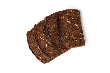 Dark rye bread with sunflower seeds isolated on white background.