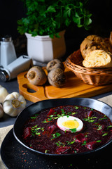 Delicious beetroot borscht with egg