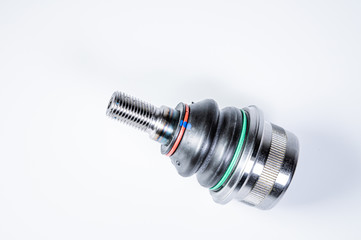 New spare parts spherical ball joints of a suspension bracket of a car on a gray background