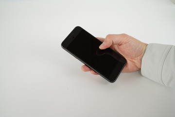 スマートフォンと作業着