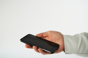 スマートフォンと作業着