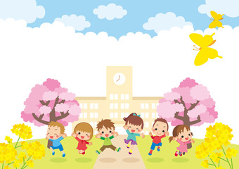 Obraz na płótnie Canvas 桜咲く春の小学校の前で元気にジャンプするキッズ