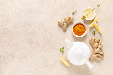 Ginger turmeric tea with honey, fresh lemon and mint