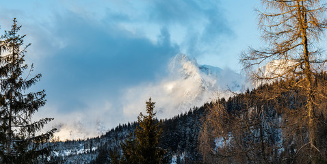 Fototapeta na wymiar A mountain covered in clouds