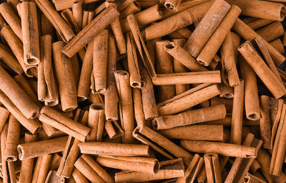 Cinnamon Background. Pile Of Cinnamons Stick Top View.