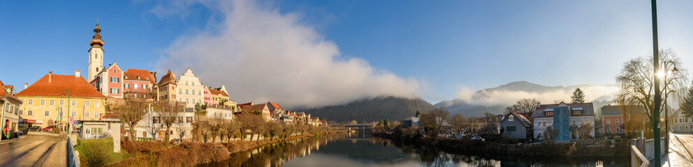 Frohnleiten panorama small city above Mur river in Styria,Austria. View at Parish church, town and river Mur. Famous travel destination.