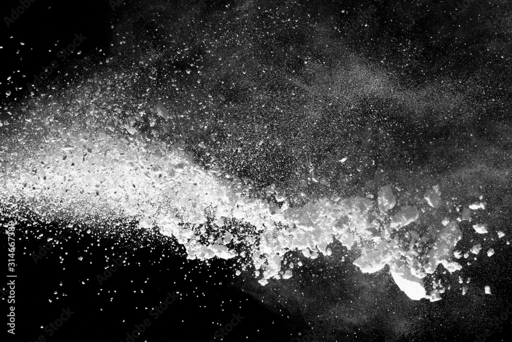 Wall mural White powder explosion isolated on black background.