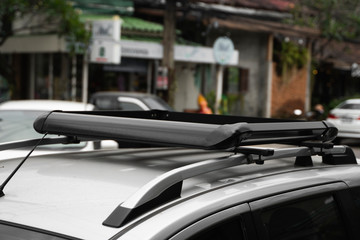 Trunk on the roof of the car for attaching large loads. Roof trunk for bicycle transportation, traveling by car.