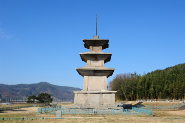 Obraz premium Three-story Stone Pagodas on Gamunsa Temple Site in Gyeongju, South Korea.