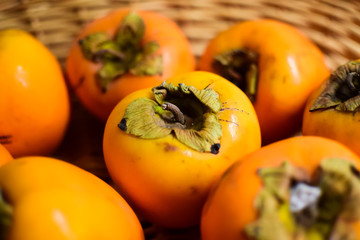 Orange juice persimmon close-up. Food background.