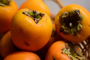 Orange juice persimmon close-up. Food background.