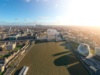 London city centre aerial panorama view: financial district, Thames river, Belfast, skyscrappers, warf and buildings and St. Pauls Cathedral, Tower Bridge and The Tower