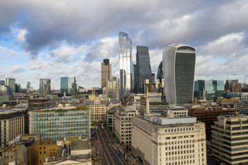 London city centre aerial panorama view: financial district, Thames river, Belfast, skyscrappers, warf and buildings and St. Pauls Cathedral, Tower Bridge and The Tower