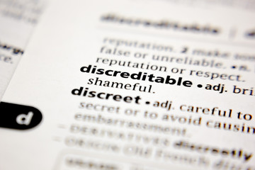 Word or phrase discreditable in a dictionary.