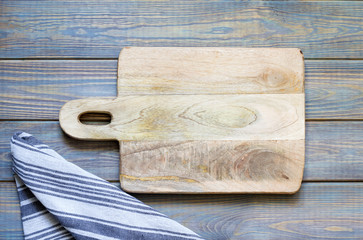 Empty cutting board on blue old boards abstract food old vintage background