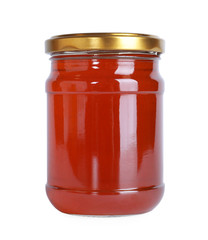 Glass jar of wildflower honey isolated on white