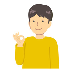 OKサインの黄色い服を着た男の子