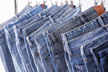 Closeup view of rack with different jeans