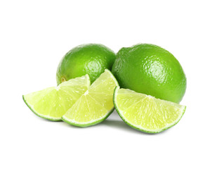 Fresh ripe green limes isolated on white