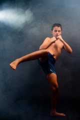 Obraz premium Young boy doing crazy photo session 