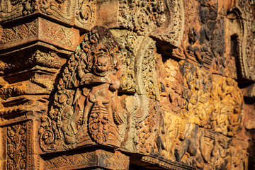 Sculpture of Hindu gods on the wall of Banteay Srei, Angkor Wat, Cambodia