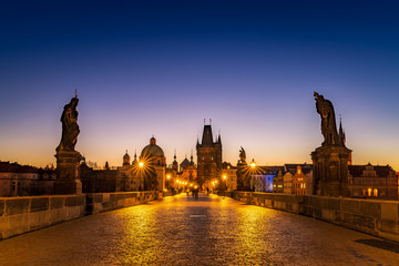 Obraz premium View of Charles Bridge in Prague during sunset, Czech Republic. The world famous Prague landmark.