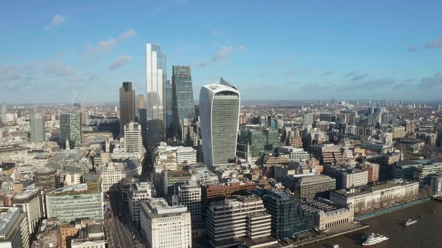 London city centre aerial panorama view: financial district, Thames river, Belfast, skyscrappers, warf and buildings and St. Pauls Cathedral, Tower Bridge and The Tower