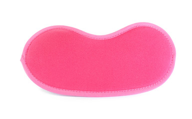 Pink sleeping eye mask isolated on white, top view. Bedtime