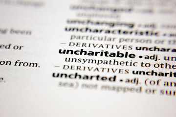Word or phrase uncharitable in a dictionary.