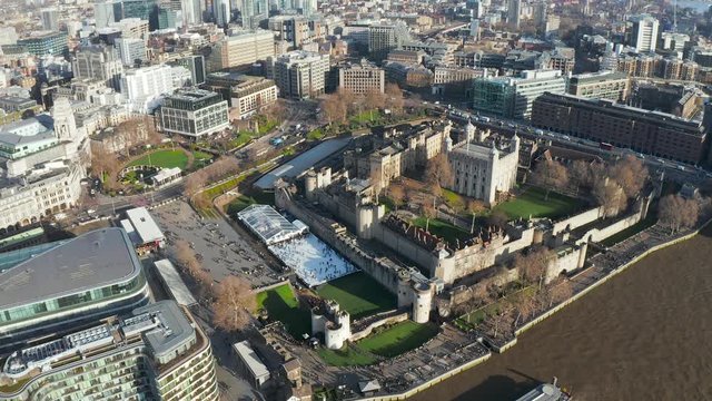 London city centre aerial panorama view: financial district, Thames river, Belfast, skyscrappers, warf and buildings and St. Pauls Cathedral, Tower Bridge and The Tower