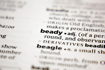 Word or phrase beady in a dictionary.