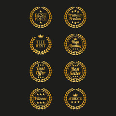 Set of golden laurel wreaths on black background.