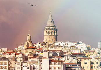 Galata Tower or Galata Kulesi  in Istanbul after Rain with Rainbow on Sky, Turkey