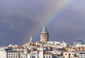Fototapeta na wymiar Galata Tower or Galata Kulesi in Istanbul after Rain with Rainbow on Sky, Turkey