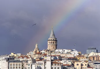 Deurstickers Galata Tower or Galata Kulesi  in Istanbul after Rain with Rainbow on Sky, Turkey © Savvapanf Photo ©